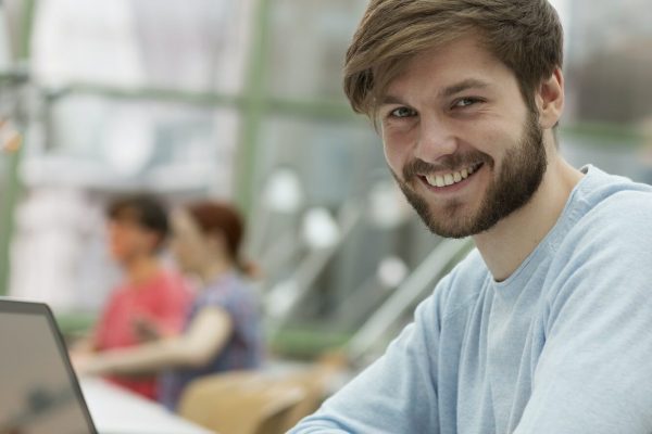 Portrait of student learning in a university library